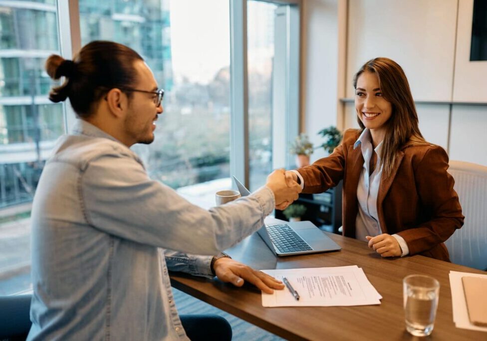 Client consultation with immigration consultant reviewing documents and fees in Toronto
